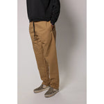 "The Original Limpies" baggy skate pant in beige. These classic baggy pants respect the volume of the 90s, offering the most comfortable vintage skate fit. Made in USA.