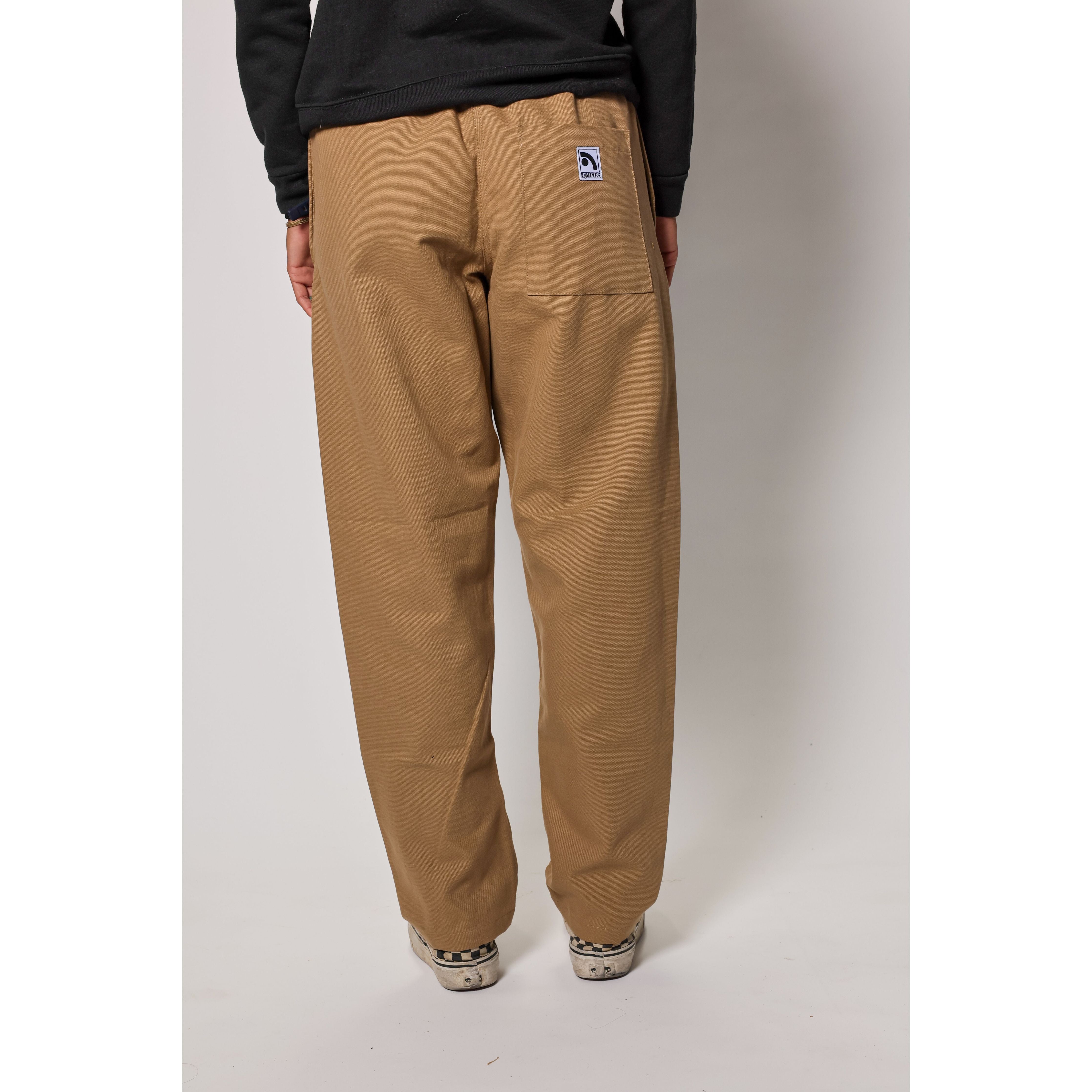 "The Original Limpies" baggy skate pant in beige. These classic baggy pants respect the volume of the 90s, offering the most comfortable vintage skate fit. Made in USA.