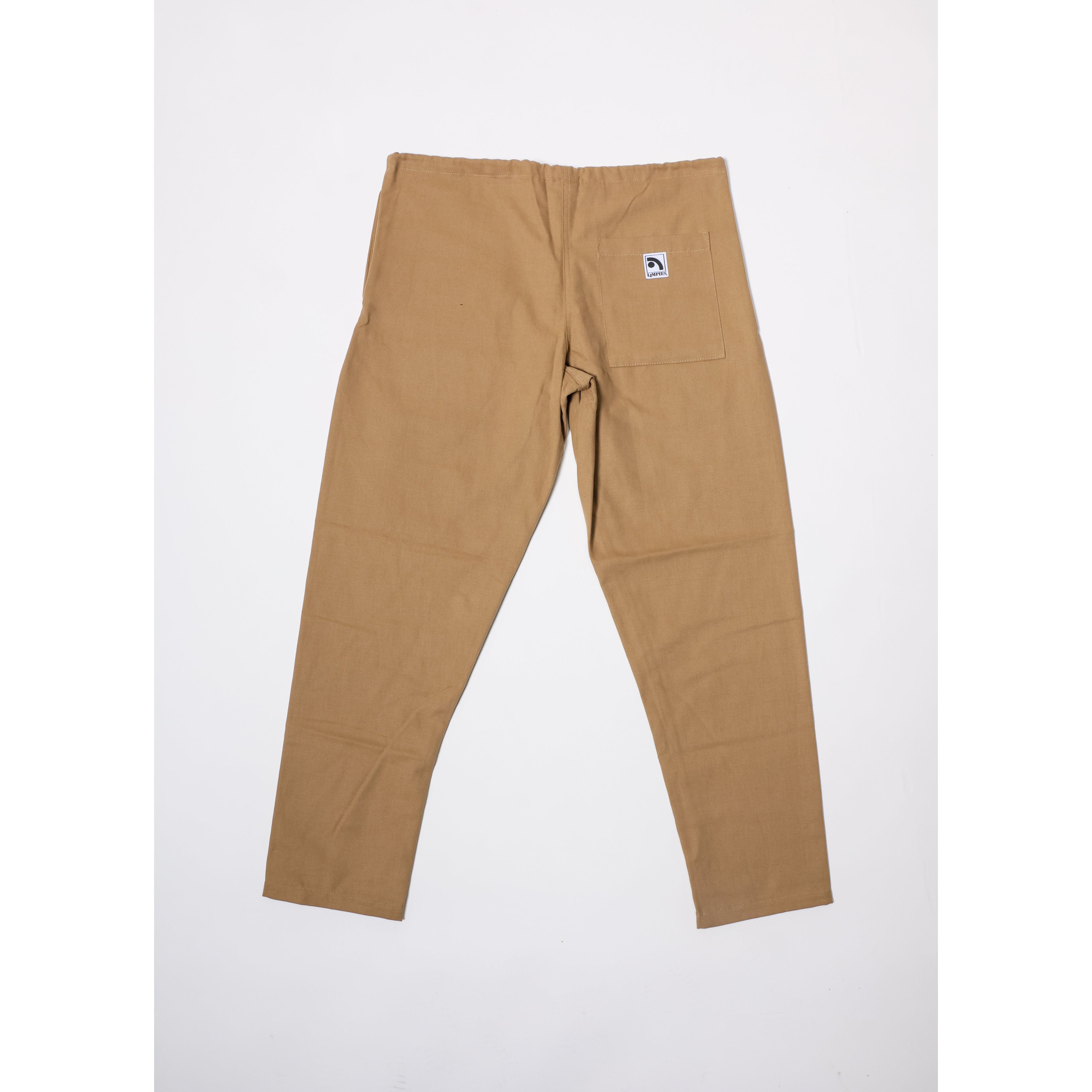 "The Original Limpies" baggy skate pant in beige. These classic baggy pants respect the volume of the 90s, offering the most comfortable vintage skate fit. Made in USA.