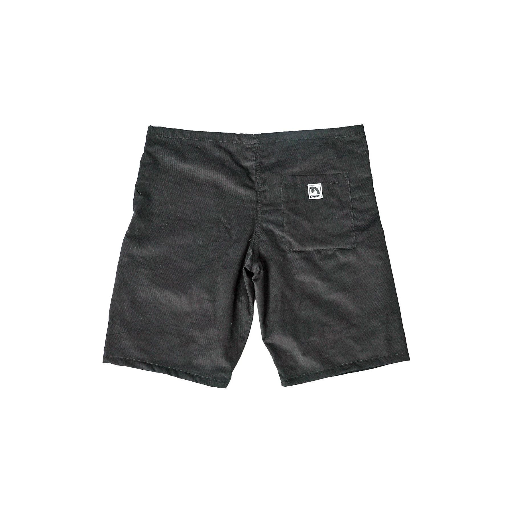 "The Original Limpies" skate shorts in black corduroy. Corduroy skate shorts with retro texture and a wide cut that define retro streetwear of the 90s. Made in USA.