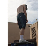 "The Original Limpies" skate shorts in black corduroy. Corduroy skate shorts with retro texture and a wide cut that define retro streetwear of the 90s. Made in USA.