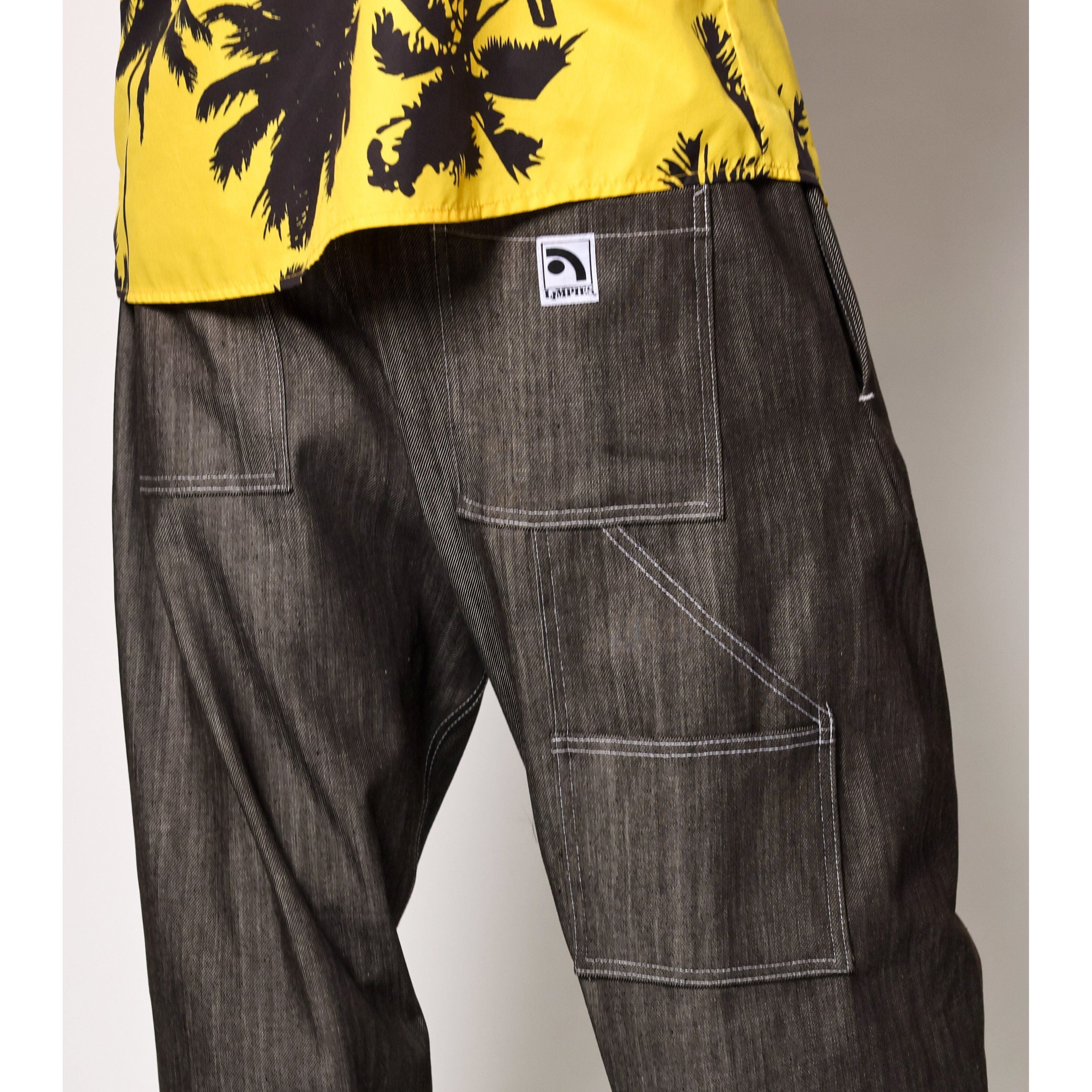 "Carp Skate Pant" in black denim with contrast stitching, retro workwear style. 90s streetwear durability with the loose fit demanded by authentic workwear skate pants. Made in USA.