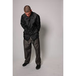 "Carp Skate Pant" in black denim with contrast stitching, retro workwear style. 90s streetwear durability with the loose fit demanded by authentic workwear skate pants. Made in USA.