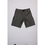 "Over the Knee" skate shorts in black denim with contrast stitching. Workwear style shorts with the wide cut and resilience of 90s denim skatewear for the asphalt. Made in USA.