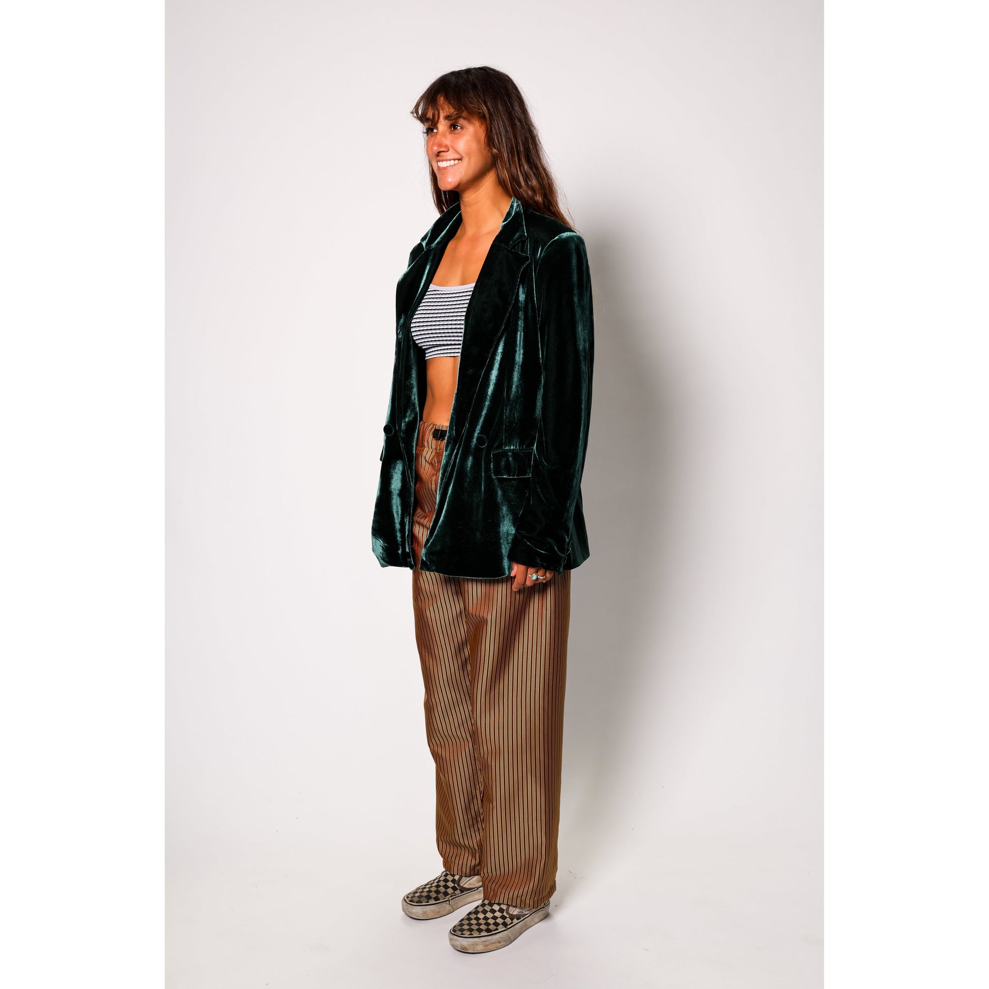Baggy skate pants in burgundy with a gold stripe. These retro striped skate pants offer a bold 90s street style and a perfect baggy fit for the streets. Made in USA.