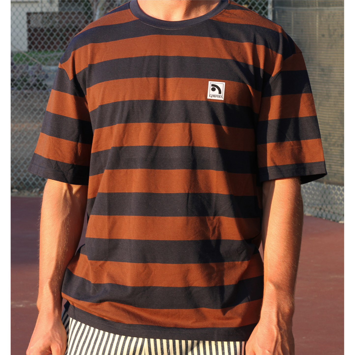 EZ Stripe skate shirt with an oversized fit and thick stripes. The definitive 90s streetwear style, this oversized button up is perfect for an authentic, laid-back session on the board.