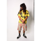 "Over the Knee" skate shorts with a striking Flower Paisley print. Unique vintage pattern shorts that channel the daring retro skate jorts of the 90s decade. Made in USA.