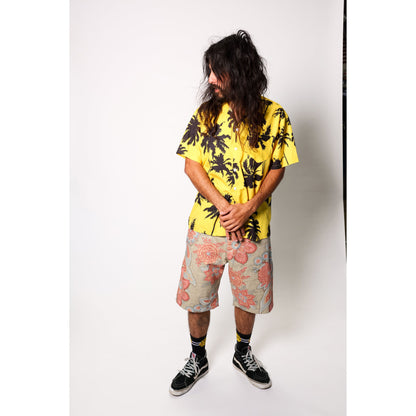 "Over the Knee" skate shorts with a striking Flower Paisley print. Unique vintage pattern shorts that channel the daring retro skate jorts of the 90s decade. Made in USA.