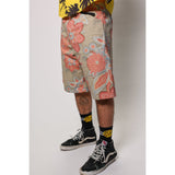 "Over the Knee" skate shorts with a striking Flower Paisley print. Unique vintage pattern shorts that channel the daring retro skate jorts of the 90s decade. Made in USA.