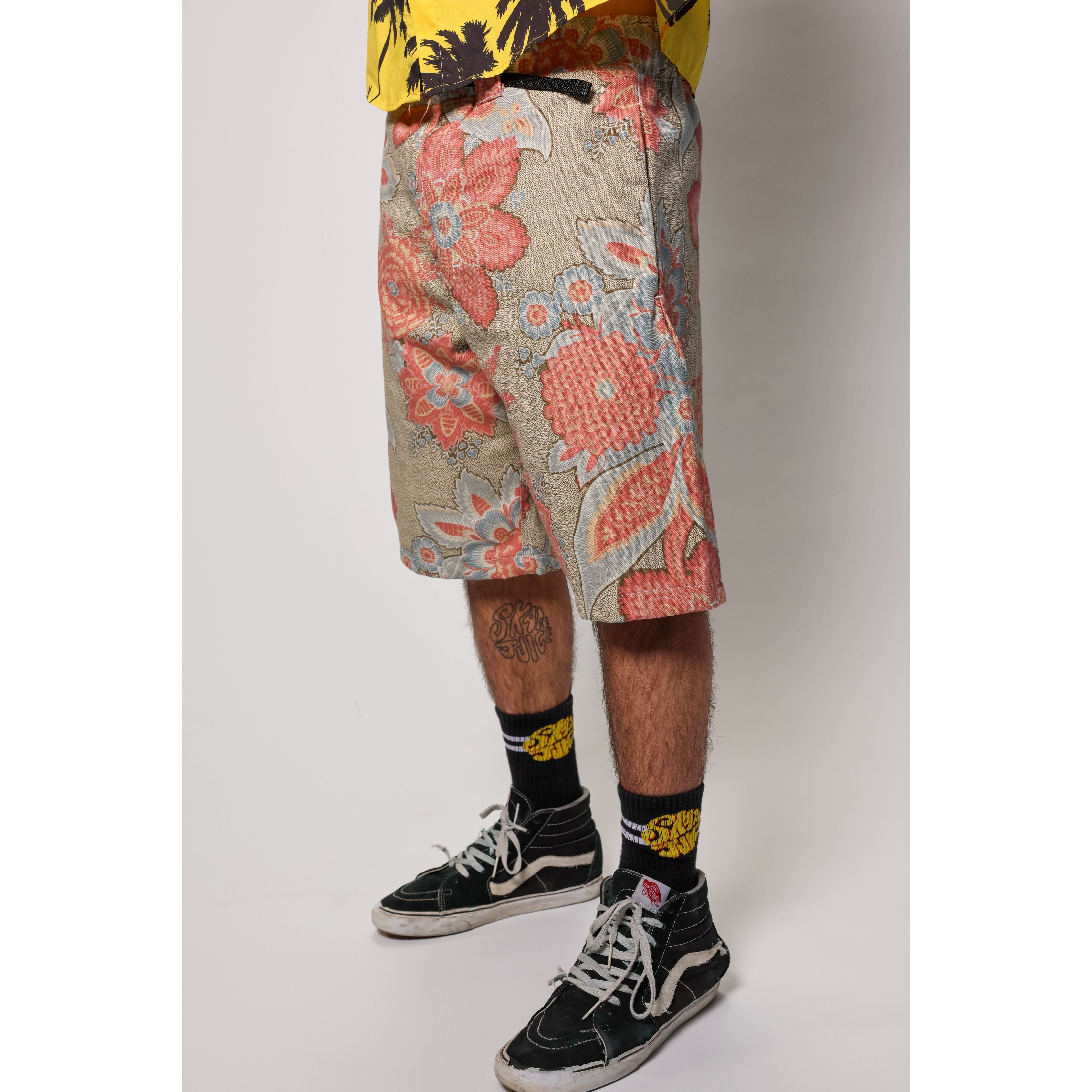 "Over the Knee" skate shorts with a striking Flower Paisley print. Unique vintage pattern shorts that channel the daring retro skate jorts of the 90s decade. Made in USA.