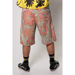 "Over the Knee" skate shorts with a striking Flower Paisley print. Unique vintage pattern shorts that channel the daring retro skate jorts of the 90s decade. Made in USA.