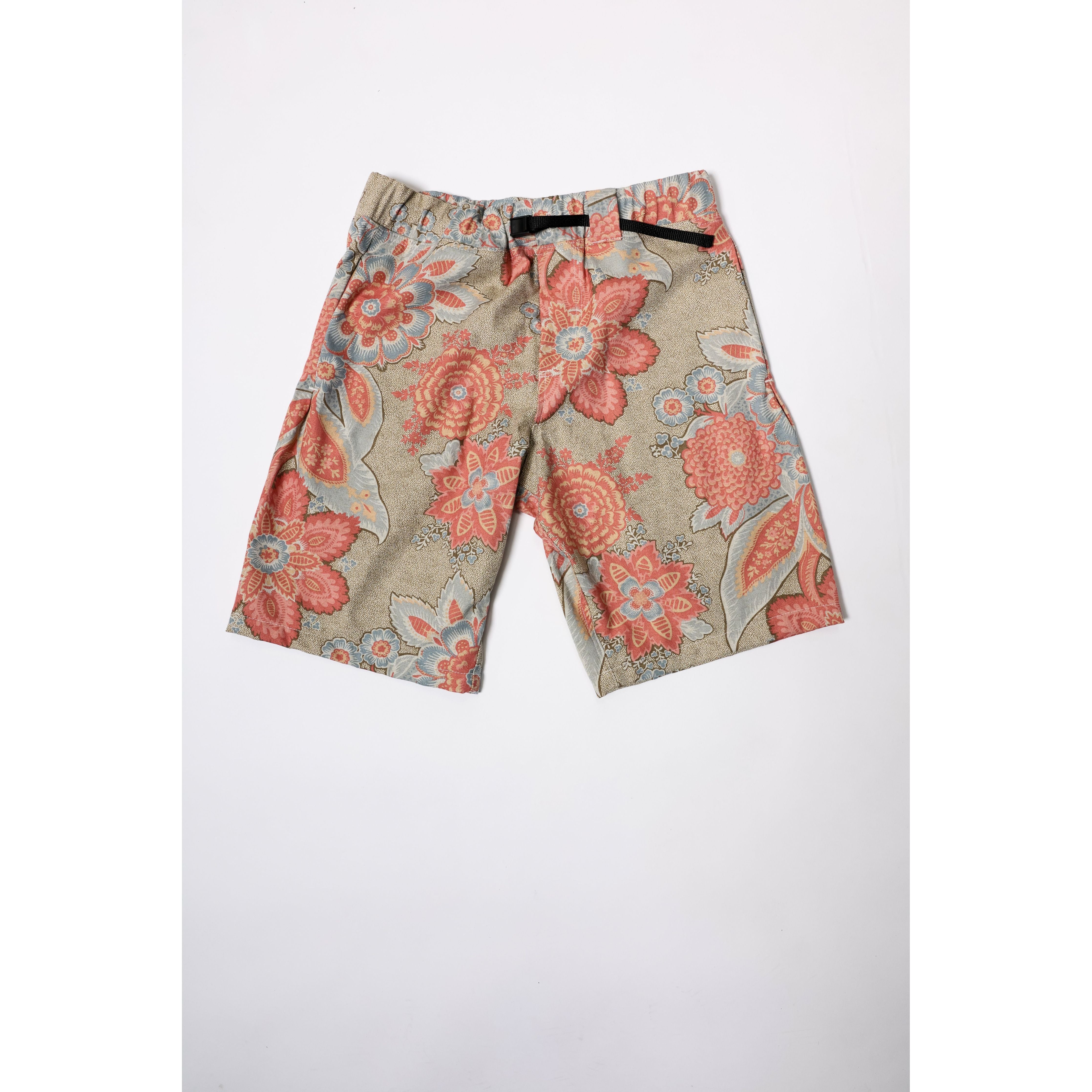 "Over the Knee" skate shorts with a striking Flower Paisley print. Unique vintage pattern shorts that channel the daring retro skate jorts of the 90s decade. Made in USA.