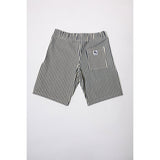 "Over the Knee" skate shorts with a Hickory stripe pattern. The wide cut that recalls retro jorts style and 90s baggy skatewear, maintaining authenticity and urban flow.