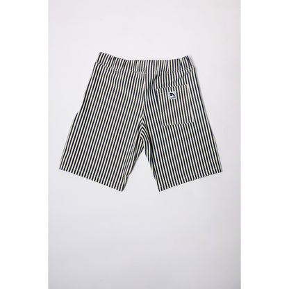 "Over the Knee" skate shorts with a Hickory stripe pattern. The wide cut that recalls retro jorts style and 90s baggy skatewear, maintaining authenticity and urban flow.