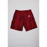 "Over the Knee" skate shorts with a red and black cheetah print. A 90s streetwear print that screams attitude, with the perfect baggy fit for the baggy skate shorts of the era. Made in USA.